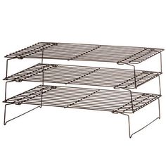 three tiered metal shelf with wire on each side and two shelves above the top