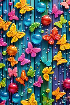 colorful butterflies and bubbles are on the blue wood paneled wall, with water droplets all over them