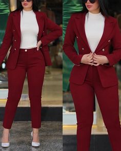 the woman is wearing a red suit and white top