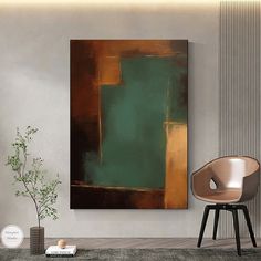 an abstract painting hangs on the wall next to a chair and table with a potted plant