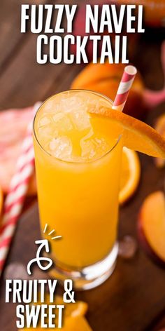 an orange drink in a tall glass with a straw garnish on the rim