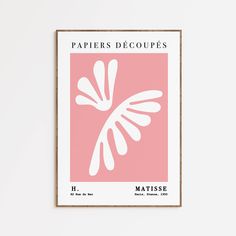 a pink and white poster with the words papers decoupes on it in front of a