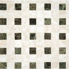 a white and black checkered tile pattern with green squares on the bottom right corner