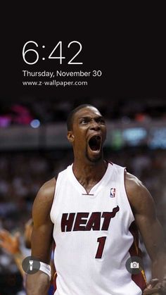 an image of a basketball player with his mouth open on the phone screen that says heat