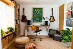 an eclectic mid - century inspired home recording studio is featured in this ad for the magazine