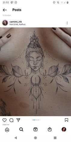 the back of a woman's chest with an image of a buddha on it