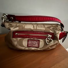 Euc Vintage Coach Poppy Sateen Handbag #H1280-F20044 Gorgeous Tan With Red Trim, Has Silver Chain Crossbody Strap 2 Red Coach Tags Heart Zipper Pull On Exterior Pocket, 1 Interior Zipper Pocket And 1 Open Pocket Approximately 12" X 6.5" X 3.5 Vintage Coach Purses, Red Coach Purse, Vintage Coach Purse, Vintage Coach Bags, Coach Poppy, One Wish, Coach Bag, Bag Vintage, Vintage Coach