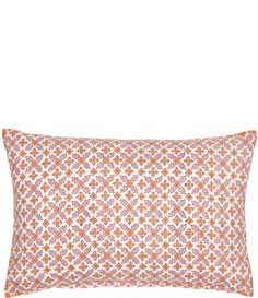 an orange and pink pillow on a white background