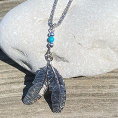 Feather Necklace Silver Tone With A Turquoise Bead. Northern Plains Reservation Aid. 18” Chain. Brand New. Native Necklace, Silver Feather Necklace, Turquoise Cross Pendant, Horseshoe Crafts, Christian Necklace, Fish Necklace, Feather Necklace, Turquoise Cross, Silver Pearl Necklace