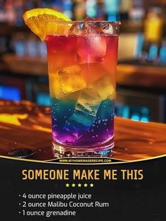 there is a colorful drink on the bar