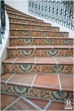 some steps with blue and brown designs on them