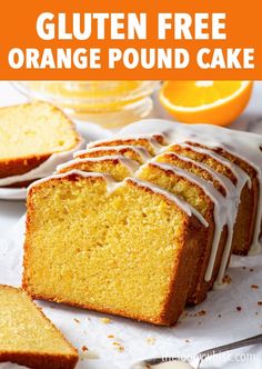 an orange pound cake with white glaze on top and slices cut off to show the icing