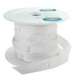 white spooling cord with two holes on each side