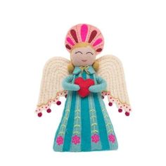 an angel doll holding a heart on a white background