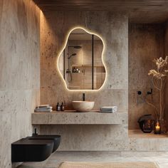 a bathroom with a sink, mirror and lights on the wall above it's counter