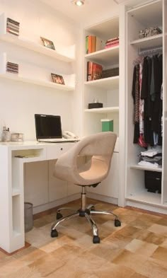 a chair that is sitting in front of a desk with a computer on top of it