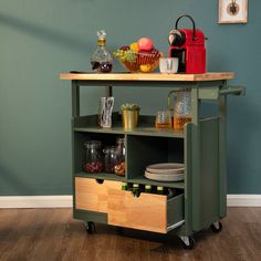 a kitchen cart with food and drinks on it