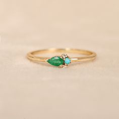 Crafted with 14k Solid Gold, this ring are not only stylish but also lightweight. You can wear this ring all day easily. Natural Pear Emerald With Turquoise & Diamond Wedding Stacking Band. Handmade jewelry, Engagement ring, Stackable ring, Anniversary ring. Available In all gemstone. you can select the gemstone in drop down variation. Ruby, Blue Sapphire, Pink Sapphire, Amethyst, Citrine, Aquamarine, Black Onyx, Moonstone, Turquoise You can gift them on Anniversary, Birthday and Christmas. Also Turquoise Engagement Rings, Turquoise Wedding Ring, Gemstone Wedding Band, Turquoise Wedding Rings, Turquoise Ring Engagement, Gold Rings Stackable, Arizona Turquoise, Zambian Emerald, Aquamarine Ring