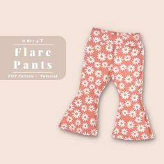 a pair of pink and white pants with flowers on them