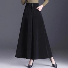 Winter Long Skirt With Pockets, Long Skirt With Pockets For Winter, Winter Bottoms With Pockets, Long Skirt Style, Gray Skirt For Winter, Gray Long Skirt For Work, Gray Solid Color Winter Bottoms, Gray Winter Skirt, Gray Long Skirt For Workwear, Gray Long Skirt For Winter