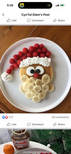 a white plate topped with pancakes covered in fruit