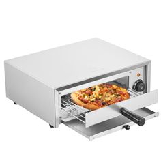 a pizza is being taken out of an oven