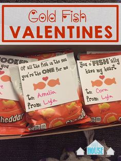 three bags of goldfish valentine's candy are on display