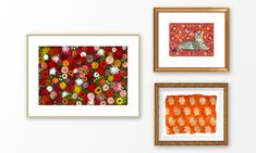 four framed pictures hang on the wall above them are flowers and a rabbit in a red floral print