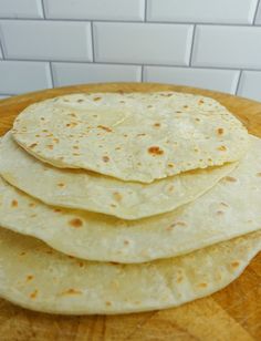 four tortillas stacked on top of each other