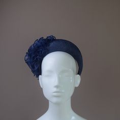 This very flattering halo crown style is very much in vogue this season. This one has been hand blocked and wired using traditional millinery techniques. Formed from navy sinamay straw and embellished with an organza frill.   MADE TO ORDER - Please allow 2 weeks to process your order. However if you need your headpiece urgently please choose Next Day Delivery at checkout and provide us with the date it is required. Your order will be given priority and completed within 1 - 3 days and sent by Roy Adjustable Formal Costume Headband, Blue Crown Headpiece For Party, Blue Party Crown Headpiece, Adjustable Ceremony Headband, Adjustable Headband For Ceremony, Elegant Adjustable Fascinator With Matching Headband, Adjustable Headband Fascinator For Ceremonies, Elegant Adjustable Headband With Structured Crown, Adjustable Bridal Headband For Formal Occasions