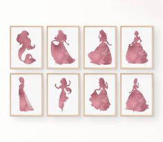 six princess silhouettes are displayed on the wall