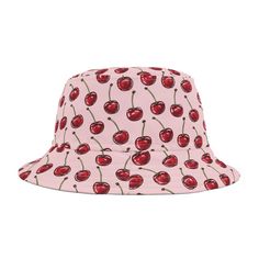 This bucket hat features a fun Cherry Pattern to inspire joy and happiness. Made from soft and durable polyester, our Bucket Hats make for some delightful cozy style.    Easy to wash and clean, these Pink With Red Cherries Pattern Bucket Hats are simply a great style choice. 🌙 Materials: 100% Polyester 🌙 Choose between 2 Sizes. 🌙 Choose between White or Black Stitches. 🌙 Made in the USA! 🌙 Design by CozyStarlight. Production Notes: Each CozyStarlight Bucket Hat is designed on the Computer w Trendy Red Outdoor Hat, Cute Summer Snapback Hat, Adjustable Wide Brim Novelty Hats, Novelty Adjustable Wide Brim Hats, Novelty Wide Brim Adjustable Hats, Retro Red Summer Hats, Casual Pink Summer Mini Hats, Red Bucket Hat For Summer Outdoor, Red Bucket Hat For Outdoor Summer Activities