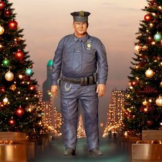 a police officer standing in front of christmas trees