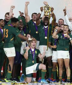 the south african rugby team celebrates with their trophy