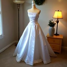 Gorgeous White Satin Wedding Dress With Detachable Train And Shaw. Beautiful White Pearl Trim Around Bust And Hem. Bust Measures 35 Inches Waist Measures 26 1/2 Inches. Tag Says Size 8 But No Way. I Tried It On I Am A 4 And I Cannot Zip It. So I Am Listing It As A 2. Wedding Dresses Vogue, British Wedding Dresses, White Satin Wedding Dress, Wedding Dress With Detachable Train, Dress With Detachable Train, Doll Wedding Dress, British Wedding, Detachable Train, Wedding Dress Patterns