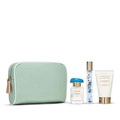 Escape to the Italian Riviera with AERIN's Mediterranean Honeysuckle Summer Essentials. In sizes perfect for travel or your vanity, layer refreshing Mediterranean Honeysuckle with crisp Ikat Jasmine for a fresh and floral scent. This Eau de Parfum pairing comes with the luxurious Mediterranean Honeysuckle Body Cream all tucked into a sage green canvas cosmetic bag. Gift Set includes: Mediterranean Honeysuckle Eau de Parfum, deluxe travel size, 1.0 oz. Ikat Jasmine Eau de Parfum, travel spray, 0.24 oz. Mediterranean Honeysuckle Body Cream, deluxe travel size, 1.0 oz. 4-piece gift set including an AERIN cosmetic bag. $180 Value. | Estée Lauder AERIN Mediterranean Honeysuckle Fragrance Essentials Set Essentials Set, Italian Riviera, Canvas Cosmetic Bag, Estée Lauder, Floral Scent, Estee Lauder, Travel Size, Summer Essentials, Body Cream