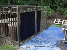 there is a metal gate that has been opened