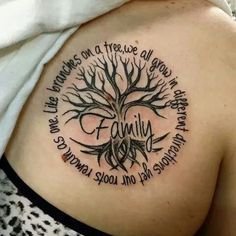 a woman with a tree tattoo on her shoulder and the words family written in it