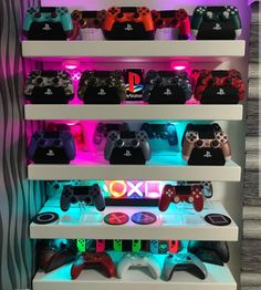 there are many video game controllers on the shelves