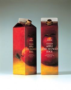 an apple and mango juice carton is shown