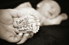 a baby's feet with words written on them