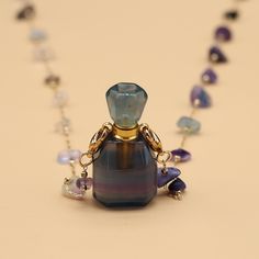 SPECIFICATIONS Style: TRENDY Shape\pattern: Square Pendant Size: 14x46mm Metals Type: Copper Material: Fluorite Material: Semi-precious Stone Fine or Fashion: Fashion Chain Type: Strand Bottle Pendant, Bottle Necklace, Square Pendant, Copper Material, Healing Powers, Emotional Healing, Shape Pattern, Perfume Bottle, Spiritual Growth