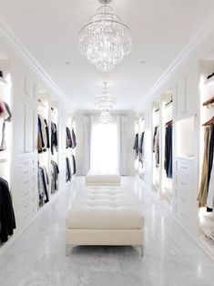 a white room with lots of closet space