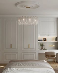 a bedroom with white walls and closets in the background, there is a bed that has a white comforter on it