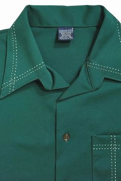 Awesome Rare 60's-70's Vintage Career Club Palace Guard Polyester Long-Sleeved Shirt, New with tags, made in USA. Size XL Tall. Has white whip-stitching on pocket, collar and cuffs. Very impressive! The color was really difficult to photograph ! In person I would call it an emerald green with a little bit of teal. It's darker than most of the photos, except the first photo is very close. Is in new condition without any damages. Measurements, Approx: Chest   47 Shoulder Span   19 Shoulder Seam to end of sleeve   26.5 Sleeve Inseam   22 Hips   24.5 Length   33.5 Ships USPS Ground Advantage Green Shirt, Collar And Cuff, Brands Outlet, First Photo, Casual Button Down Shirts, Emerald Green, Wedding Inspo, Casual Shirts, Made In Usa