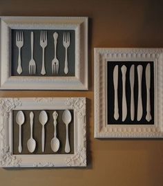 three framed pictures with forks and spoons on the wall