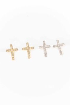 Simple gold cross earrings with embedded stones.Stainless Steel14k Gold platingMeasurements:0.38in x 0.5in / 0.95cm x 1.27cmGold: Stainless Steel, 14k Gold PlatingSilver: Stainless SteelCare Instructions:Keep jewelry away from prolonged exposure to moisture. Before any activity, take off the jewelry and store it in a dark and dry place. This includes activities such as showering, swimming, or exercising. If the jewelry does get exposed to these conditions, rinse it under cold water and completely dry it with a dry and clean towel. Style: MinimalMade In: ChinaMaterial Composition: Gold: Stainless Steel, 14k Gold PlatingSilver: Stainless SteelCare Instructions: Keep jewelry away from prolonged exposure to moisture. Before any activity, take off the jewelry and store it in a dark and dry plac Gold Cross Earrings, Cross Stud Earrings, Cross Earrings Studs, Earrings Studs, Cross Earrings, Classic Jewelry, Cross Designs, Gold Cross, Fashion Jewelry Earrings