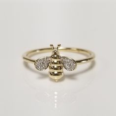 "Thanks for shopping our vintage estate store. We tend to sell well below wholesale and truly hope you enjoy all of our items. Many of the items are one of a kind, so please enjoy scrolling through the pictures and hopefully something will catch your eye. Spots are from the camera or reflections. Beautiful estate 10k yellow gold Honey Bee .10ct diamond ring. There are 22 diamonds in the setting. Ring Size: 7 Setting: 3/8\" by 1/2\" Weight: 1.49 grams Band width: 1.5mm Marked 10k." Bee Ring, Victorian Pendants, Gold Hamsa, Bee Jewelry, Bee Pendant, Heart Pendant Diamond, Cat Pendants, Eye Necklace, Diamond Heart