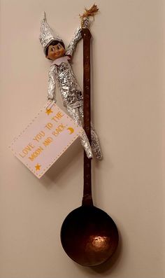 an image of a spoon with a sign on it