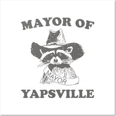 a raccoon wearing a hat with the words mayor of yapsville